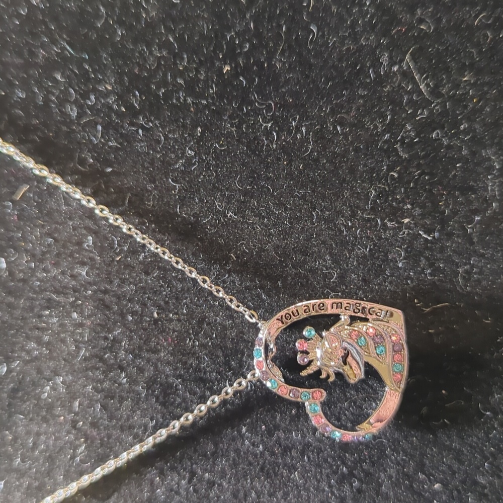 Open heart with crystals unicorn